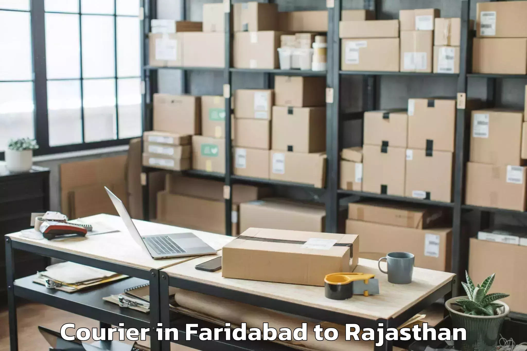 Book Faridabad to Kumher Courier Online